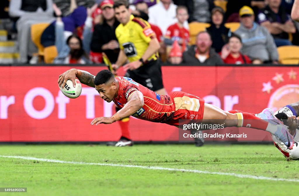 Issako Jamayne Isaako of the Dolphins scores a try during the round 12 NRL ...