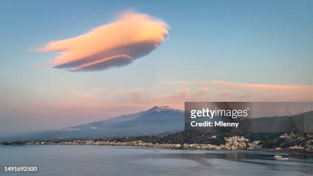 taormina sunrise mount etna lenticular cloud sicily island italy - mlenny stock pictures, royalty-free photos & images