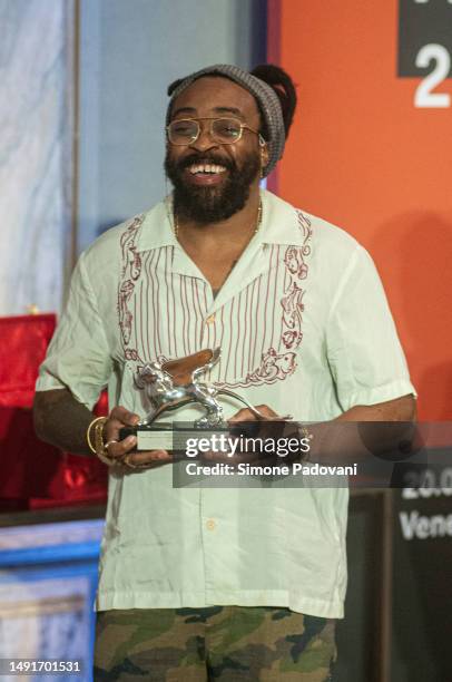 Olalekan Jeyifous pose for a portrait after receiving the Silver Lion for a promising young participant during the Award Ceremony at 18th...