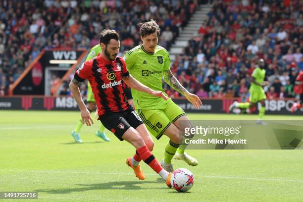 Adam Smith of AFC Bournemouth and Victor Lindelof of Manchester United battle for possession during the Premier League match between AFC Bournemouth...