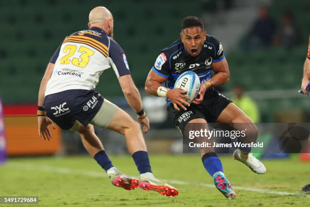 Toni Pulu of the Force attempts to avoid the tackler during the round 13 Super Rugby Pacific match between Western Force and ACT Brumbies at HBF...