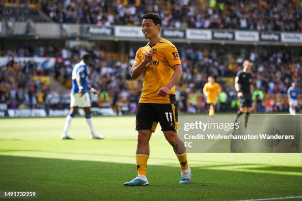 Hwang Hee-Chan of Wolverhampton Wanderers celebrates after scoring the team's first goal during the Premier League match between Wolverhampton...