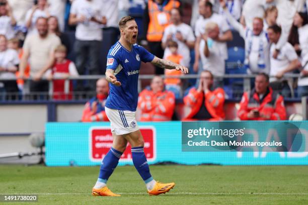 Sebastian Polter of FC Schalke 04 celebrates after scoring the team's second goal during the Bundesliga match between FC Schalke 04 and Eintracht...