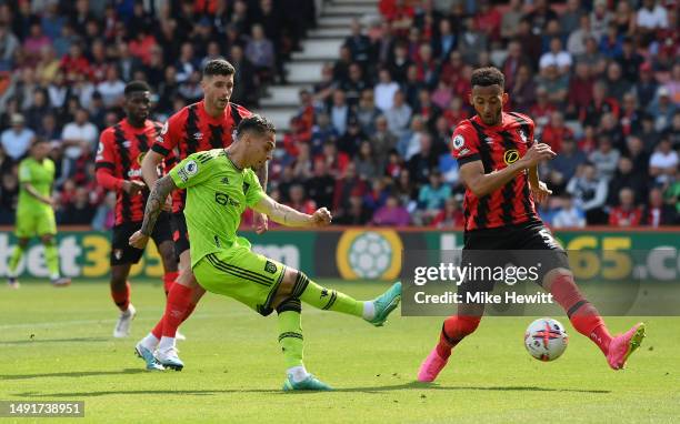 Antony of Manchester United shoots but misses whilst under pressure from Lloyd Kelly of AFC Bournemouth during the Premier League match between AFC...