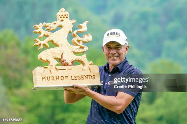 Adilson DaSilva of Brazil poses with the trophy having won the playoff against Keith Horne of South Africa during Day Three of the Riegler & Partner...