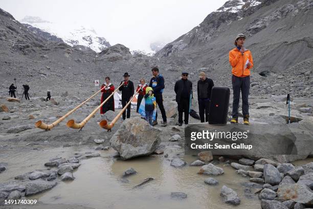 Matthias Huss , a glaciologist with ETH Zurich university and head of the Swiss glacier monitoring network, speaks at a gathering of climate...