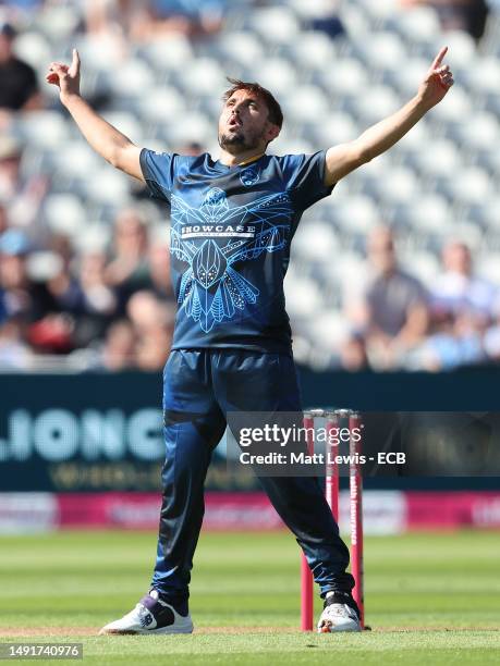 Zaman Khan of Derbyshire celebrates the wicket of George Bell of Lancashire during the Vitality Blast T20 match between Derbyshire Falcons and...