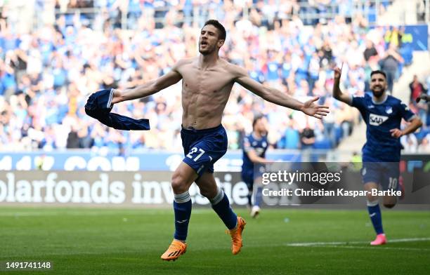 Andrej Kramaric of TSG Hoffenheim celebrates after scoring the team's third goal during the Bundesliga match between TSG Hoffenheim and 1. FC Union...