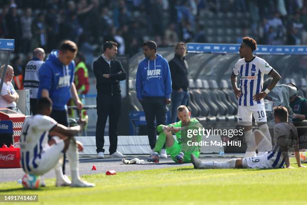 Oliver Christensen of Hertha Berlin and teammates look dejected after the final whistle of the Bundesliga match between Hertha BSC and VfL Bochum...