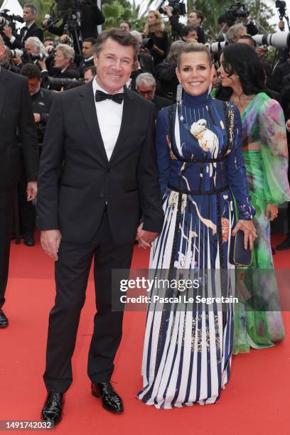 Mayor of Nice Christian Estrosi and Laura Tenoudji attend the "Killers Of The Flower Moon" red carpet during the 76th annual Cannes film festival at...