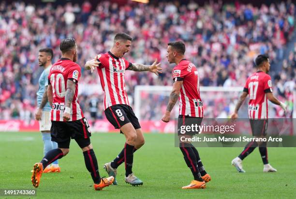 Alex Berenguer of Athletic Club celebrates with teammate Oihan Sancet after scoring the team's second goal during the LaLiga Santander match between...