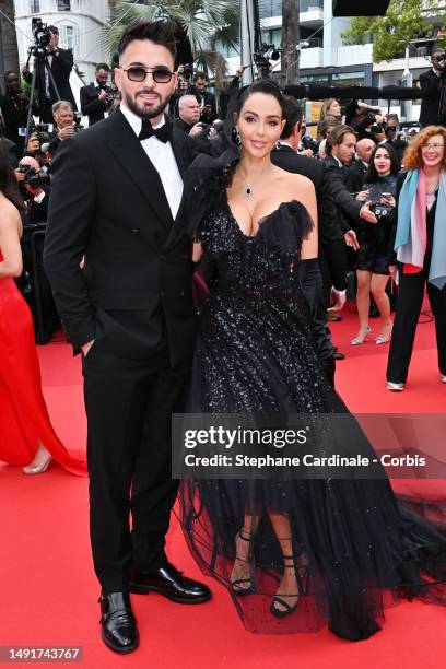 Thomas Vergara and Nabilla Benattia attends the "Killers Of The Flower Moon" red carpet during the 76th annual Cannes film festival at Palais des...