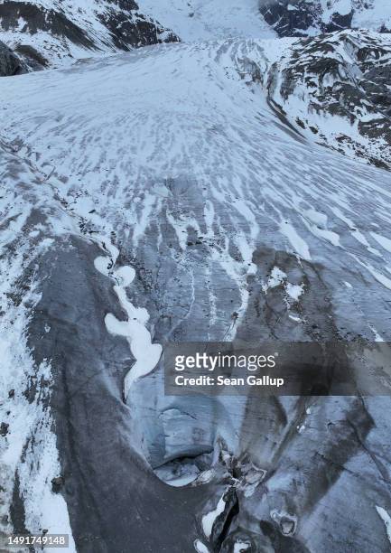 In this aerial view the receding Morteratsch glacier lies on May 20, 2023 near Pontresina, Switzerland. On June 18 Swiss voters will go to the polls...