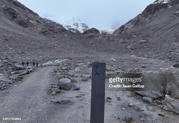 In this aerial view a marker shows where the receding Morteratsch glacier stood in 2015 on May 20, 2023 near Pontresina, Switzerland. On June 18...