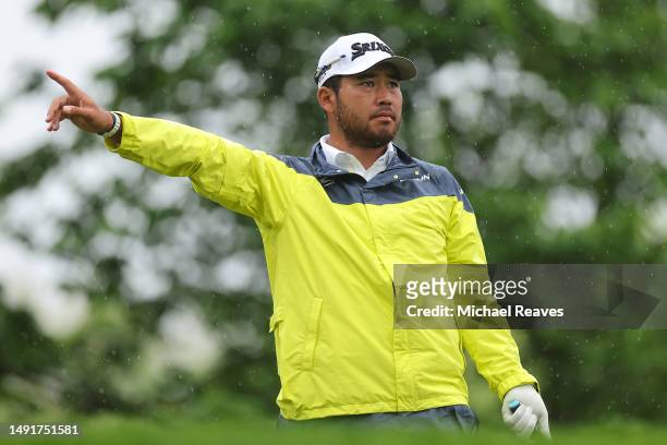 Hideki Matsuyama of Japan reacts after hitting his tee shot on the fourth hole during the third round of the 2023 PGA Championship at Oak Hill...