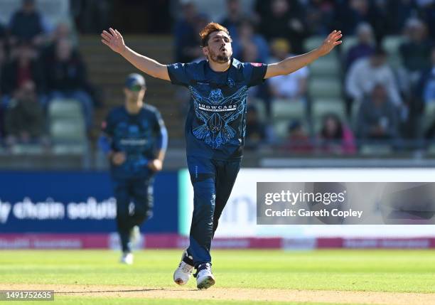 Zaman Khan of Derbyshire celebrates dismissing Colin de Grandhomme of Lancashire during the Vitality Blast T20 match between Derbyshire Falcons and...