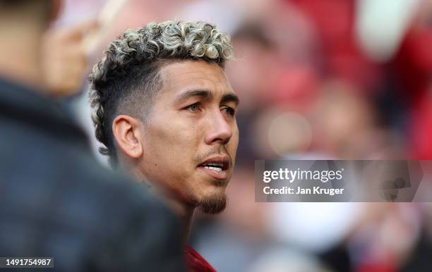 Roberto Firmino of Liverpool is seen looking emotional following his last home appearance in the Premier League match between Liverpool FC and Aston...