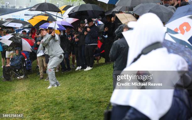 Adam Scott of Australia plays his shot on the second hole during the third round of the 2023 PGA Championship at Oak Hill Country Club on May 20,...