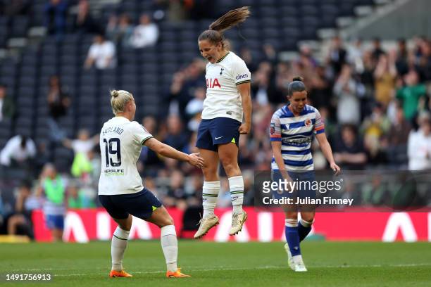 Kit Graham of Tottenham Hotspur celebrates with teammate Bethany England after scoring the team's fourth goal during the FA Women's Super League...