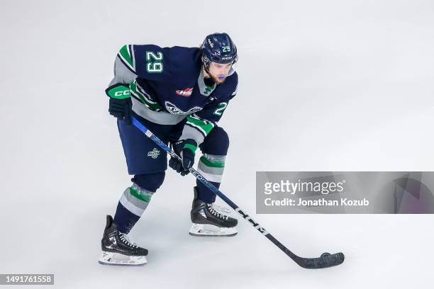 Jared Davidson of the Seattle Thunderbirds plays the puck during the third period against the Winnipeg Ice in Game Two of the 2023 WHL Championship...