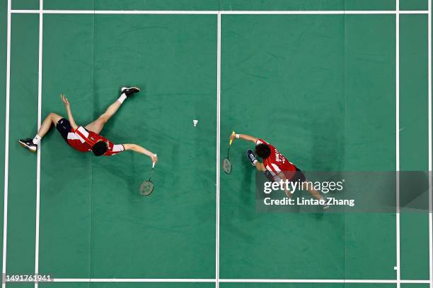 Feng Yanzhe and Huang Dongping of China compete in the Mixed Doubles Semifinal match against Kyohei Yamashita and Naru Shinoya of Japan during day...