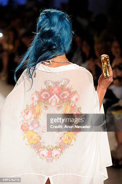 Model walks the runway during the Wildfox Swim fashion show on July 23, 2012 in Miami Beach, Florida.