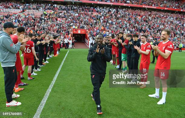 Naby Keita of Liverpool is given a guard of honour at the end of the Premier League match between Liverpool FC and Aston Villa at Anfield on May 20,...