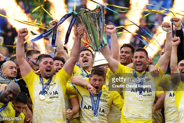 Gregory Alldritt and Romain Sazy of La Rochelle lift the Heineken Champions Cup trophy after the team's victory during the Heineken Champions Cup...