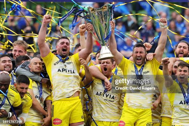 Gregory Alldritt and Romain Sazy of La Rochelle lift the Heineken Champions Cup trophy after the team's victory during the Heineken Champions Cup...