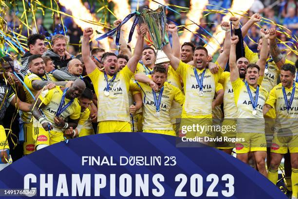 Gregory Alldritt and Romain Sazy of La Rochelle lift the Heineken Champions Cup trophy after the team's victory during the Heineken Champions Cup...