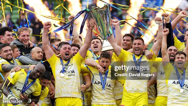 Gregory Alldritt and Romain Sazy of La Rochelle lift the Heineken Champions Cup trophy after the team's victory during the Heineken Champions Cup...