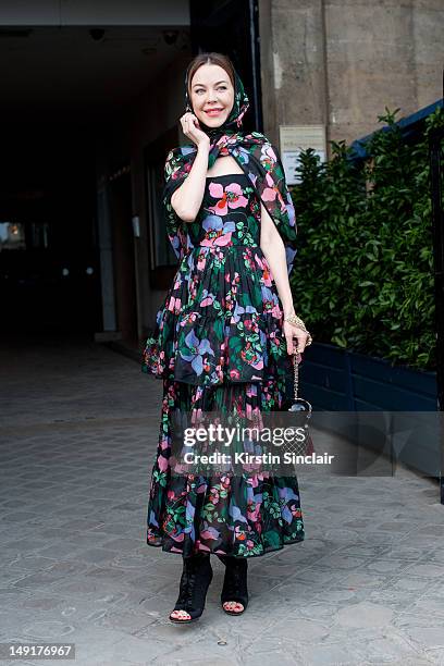 Paris, FRANCEUlyana Sergeenko, fashion designer wearing a dress she designed herself at Paris Fashion Week Autumn/Winter 2012 haute couture shows on...