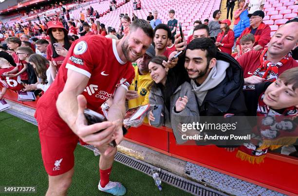 James Milner of Liverpool signing autographs at the end of the Premier League match between Liverpool FC and Aston Villa at Anfield on May 20, 2023...