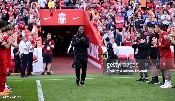Naby Keita of Liverpool given a guard of honour at the end of the Premier League match between Liverpool FC and Aston Villa at Anfield on May 20,...