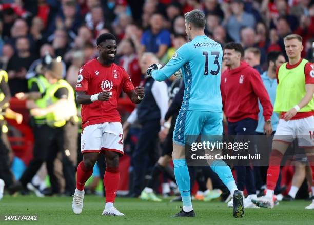 Serge Aurier and Wayne Hennessey of Nottingham Forest celebrate after the team's victory, which confirms their place in the Premier League for the...