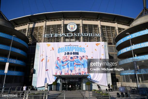 Premier League Champions' banner is revealed outside the stadium after Manchester City were confirmed as 2022/23 Premier League champions after...