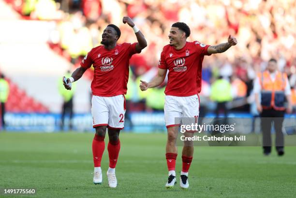 Serge Aurier and Morgan Gibbs-White of Nottingham Forest celebrate after the team's victory, which confirms their place in the Premier League for the...