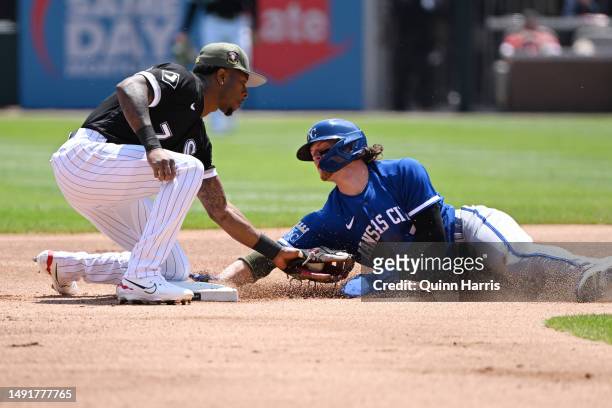 Bobby Witt Jr. #7 of the Kansas City Royals is tagged out trying to steal second base in the first inning against Tim Anderson of the Chicago White...