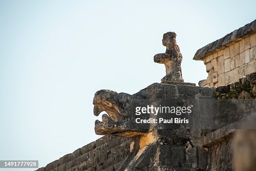 Jaguar head and Mayan Temple pyramid of Kukulkan - Chichen Itza, Yucatan, Mexico