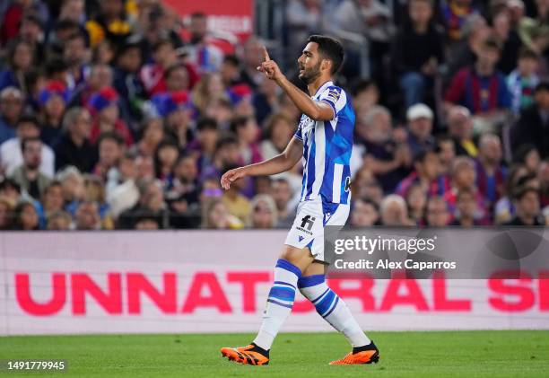 Mikel Merino of Real Sociedad celebrates after scoring the team's first goal during the LaLiga Santander match between FC Barcelona and Real Sociedad...