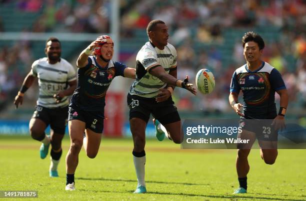 Suliano Volivolituevei of Fiji runs with the ball during the HSBC London Sevens match between Fiji and Japan at Twickenham Stadium on May 20, 2023 in...