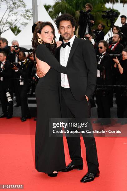 Sandra Sisley and Tomer Sisley attend the "Killers Of The Flower Moon" red carpet during the 76th annual Cannes film festival at Palais des Festivals...