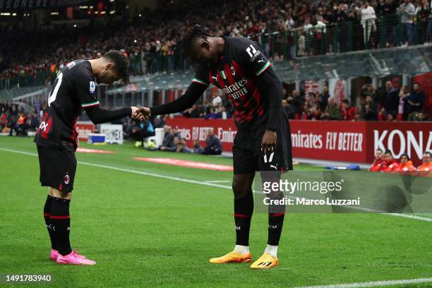 Rafael Leao of AC Milan celebrates after scoring the team's first goal with teammate Brahim Diaz during the Serie A match between AC MIlan and UC...