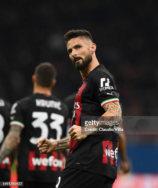 Olivier Giroud of AC Milan celebrates after scoring the goal during the Serie A match between AC Milan and UC Sampdoria at Stadio Giuseppe Meazza on...