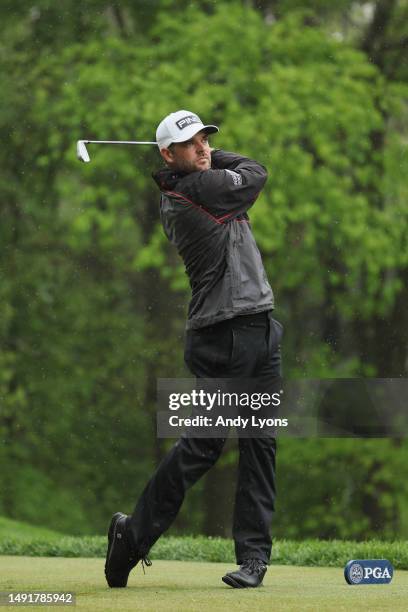 Corey Conners of Canada plays his shot from the third tee during the third round of the 2023 PGA Championship at Oak Hill Country Club on May 20,...