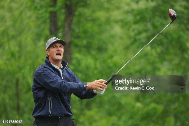 Bryson DeChambeau of the United States plays his shot from the fourth tee during the third round of the 2023 PGA Championship at Oak Hill Country...