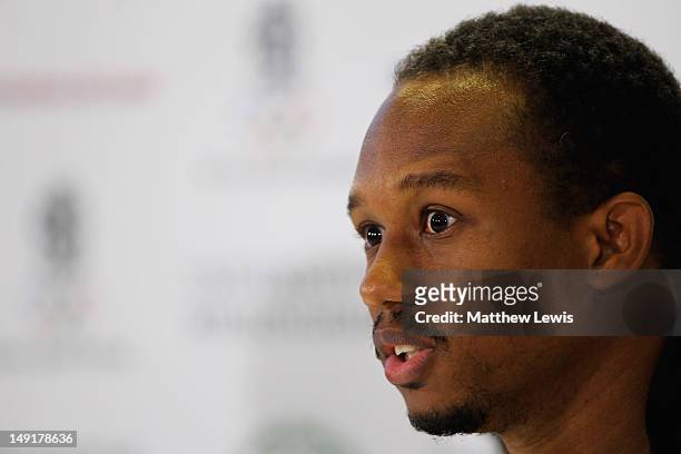 Michael Frater of Jamaica talks to the media during a training session at the University of Birmingham on July 24, 2012 in Birmingham, England.
