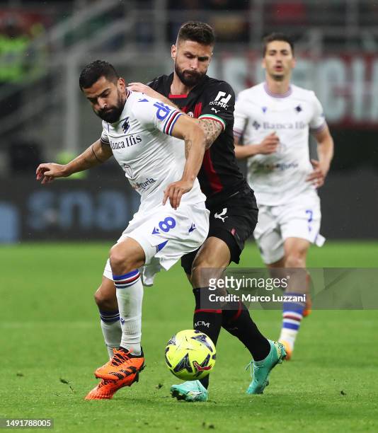 Tomas Rincon of UC Sampdoria and Olivier Giroud of AC Milan battle for the ball during the Serie A match between AC MIlan and UC Sampdoria at Stadio...