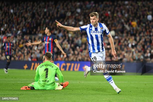 Marc-Andre ter Stegen of FC Barcelona reacts as Alexander Sorloth of Real Sociedad celebrates after scoring the team's second goal during the LaLiga...