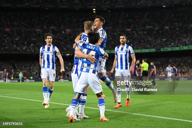 Alexander Sorloth of Real Sociedad celebrates with teammates after scoring the team's second goal during the LaLiga Santander match between FC...